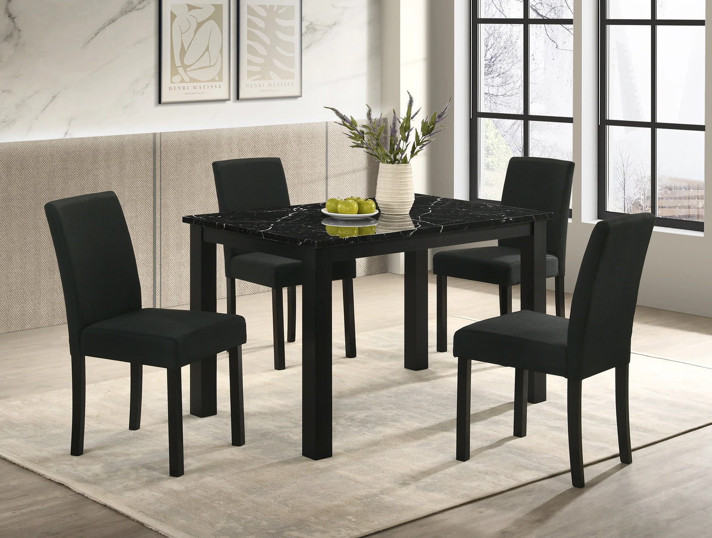 Resia Collection dining set styled in a modern dining room setting, emphasizing its chic, upscale vibe and functional elegance.
