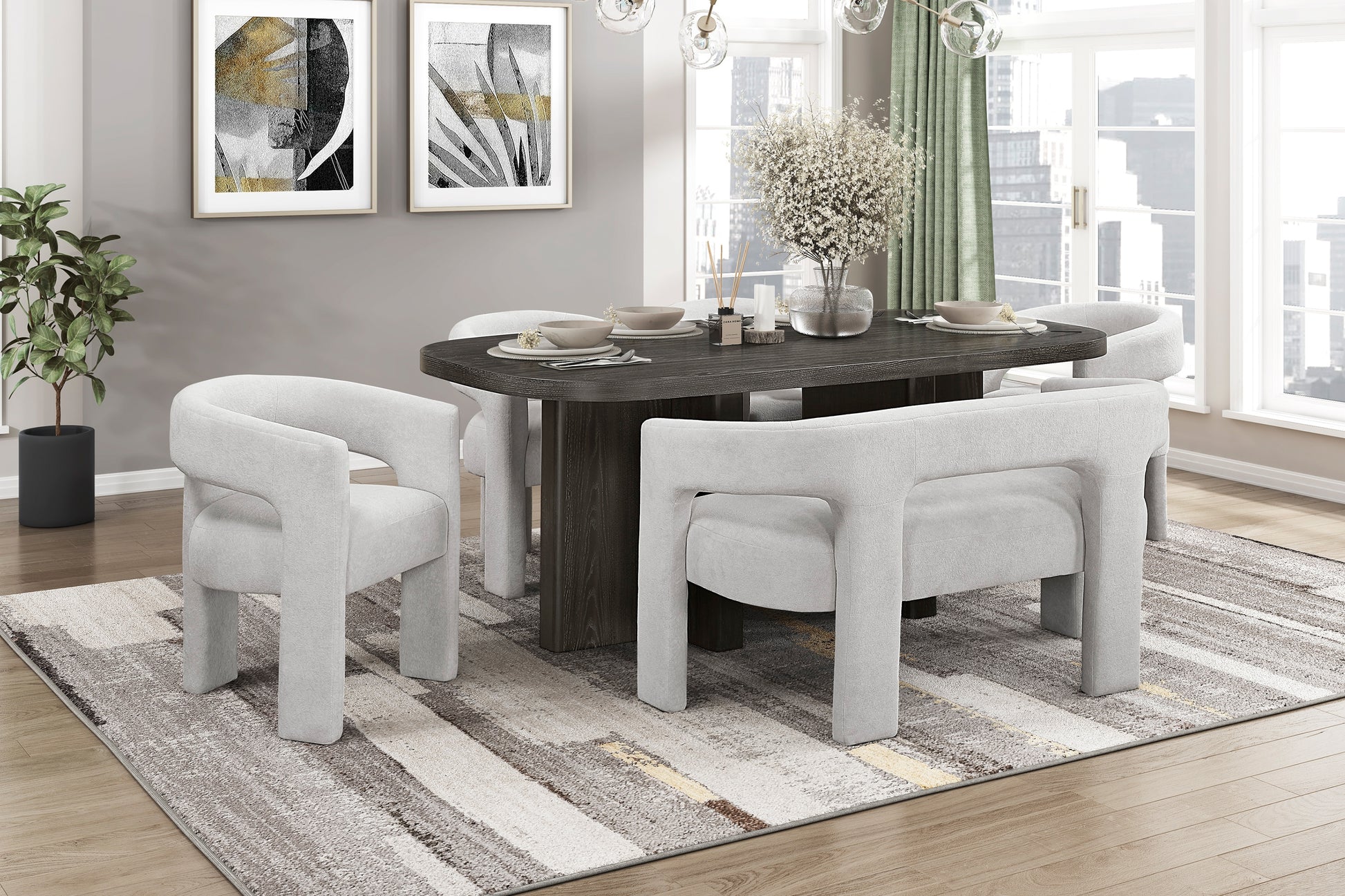 Dining room with a dark wooden table and white chairs on a striped rug.