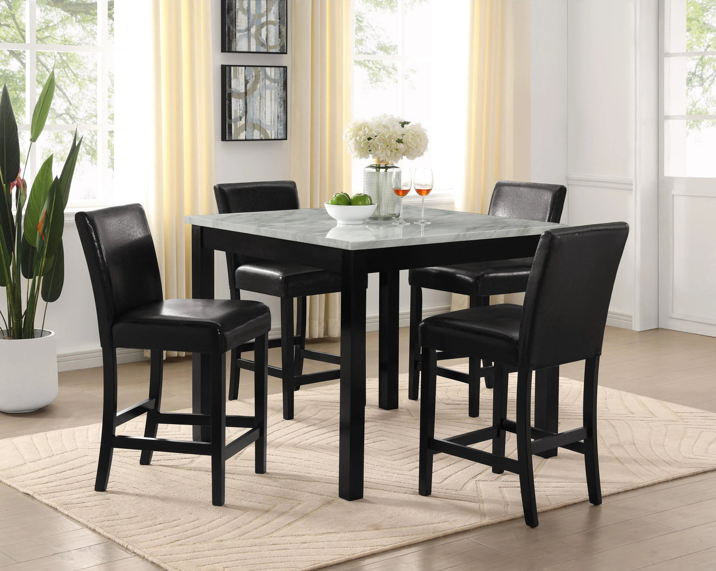 Lennon Collection counter-height dining set featuring a 42-inch square faux-marble tabletop with a sleek black frame, paired with four black faux-leather upholstered barstools accented by silver nailhead trim.