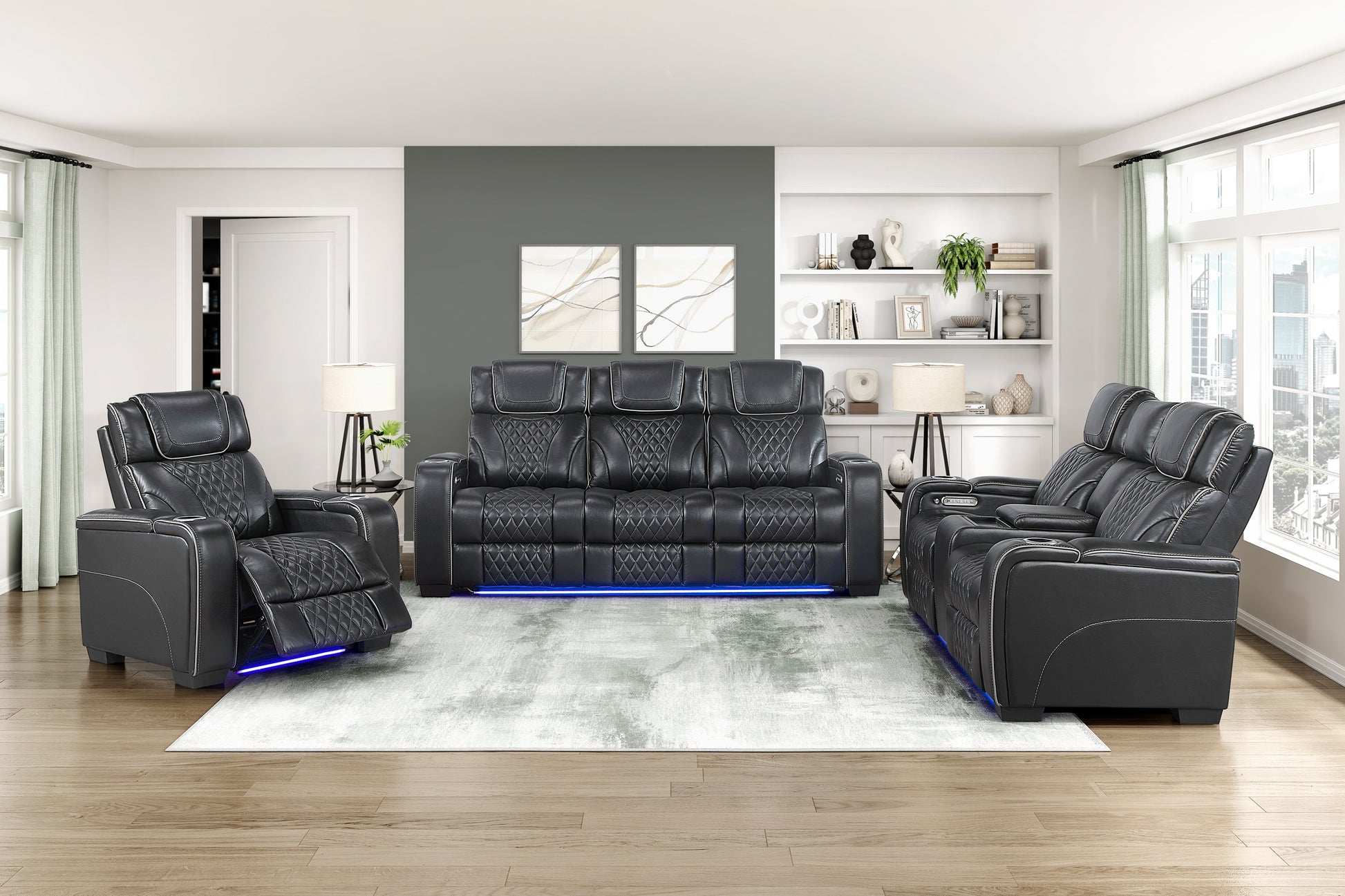 Modern living room with black leather recliner sofa set on a light wood floor.