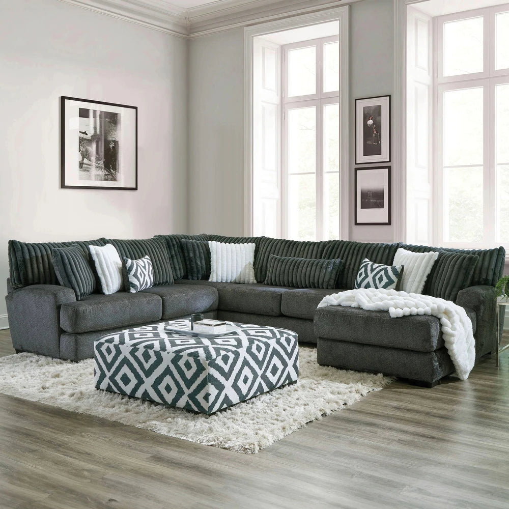 Loughton Collection sectional sofa in gun metal chenille upholstery featuring ultra-soft back cushions with channel tufting, padded arms, T-seat cushions, and wooden legs – available at Paty Furniture in Tacoma, Kent, and Burien.