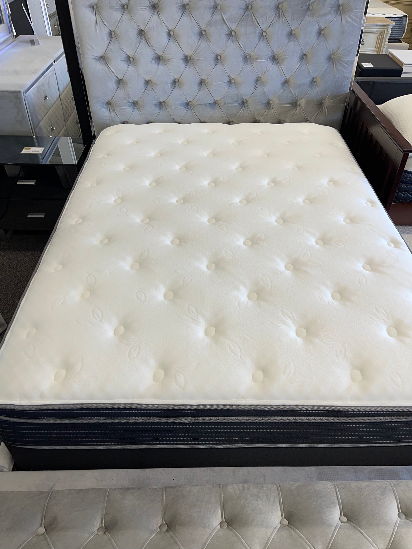Top view of plush mattress showcasing Ecoloft and Safeguard fiberfill quilted top for cushioned comfort