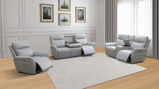 Modern living room with gray recliner chairs and a chandelier.