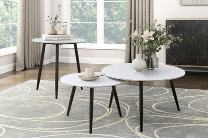 Alaina Collection 3-piece occasional table set featuring a large cocktail table and two nesting side tables with white marble-inspired sintered stone tops and black finished metal legs – available at Paty Furniture in Tacoma, Kent, and Burien.