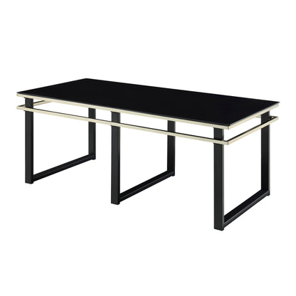 Zamir Collection rectangular cocktail table with a black tempered glass top, gold-hued banding, and sleek metal legs – available at Paty Furniture in Tacoma, Kent, and Burien.

