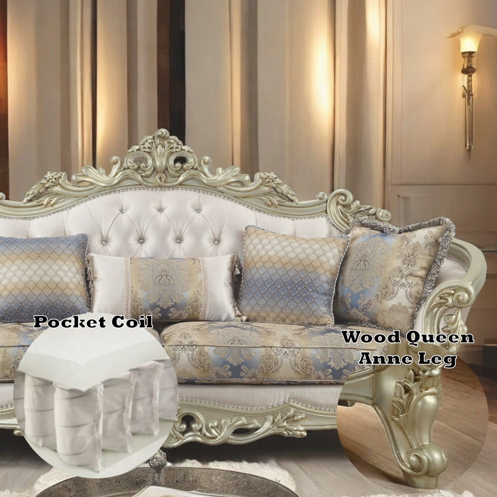 Decorative sofa with ornate design and cushions in a room setting.