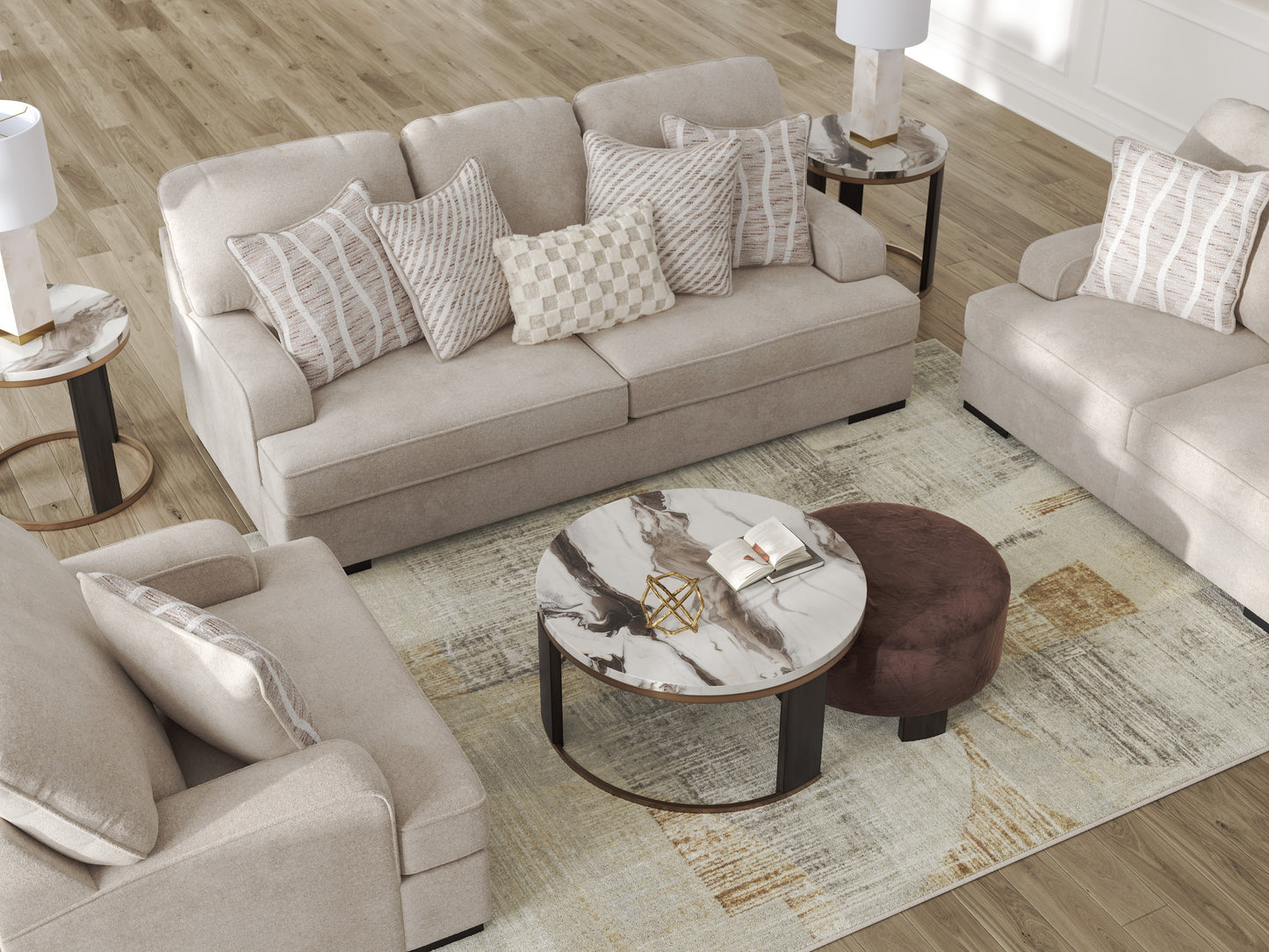 Living room with beige sofa, armchair, and coffee table on a patterned rug.