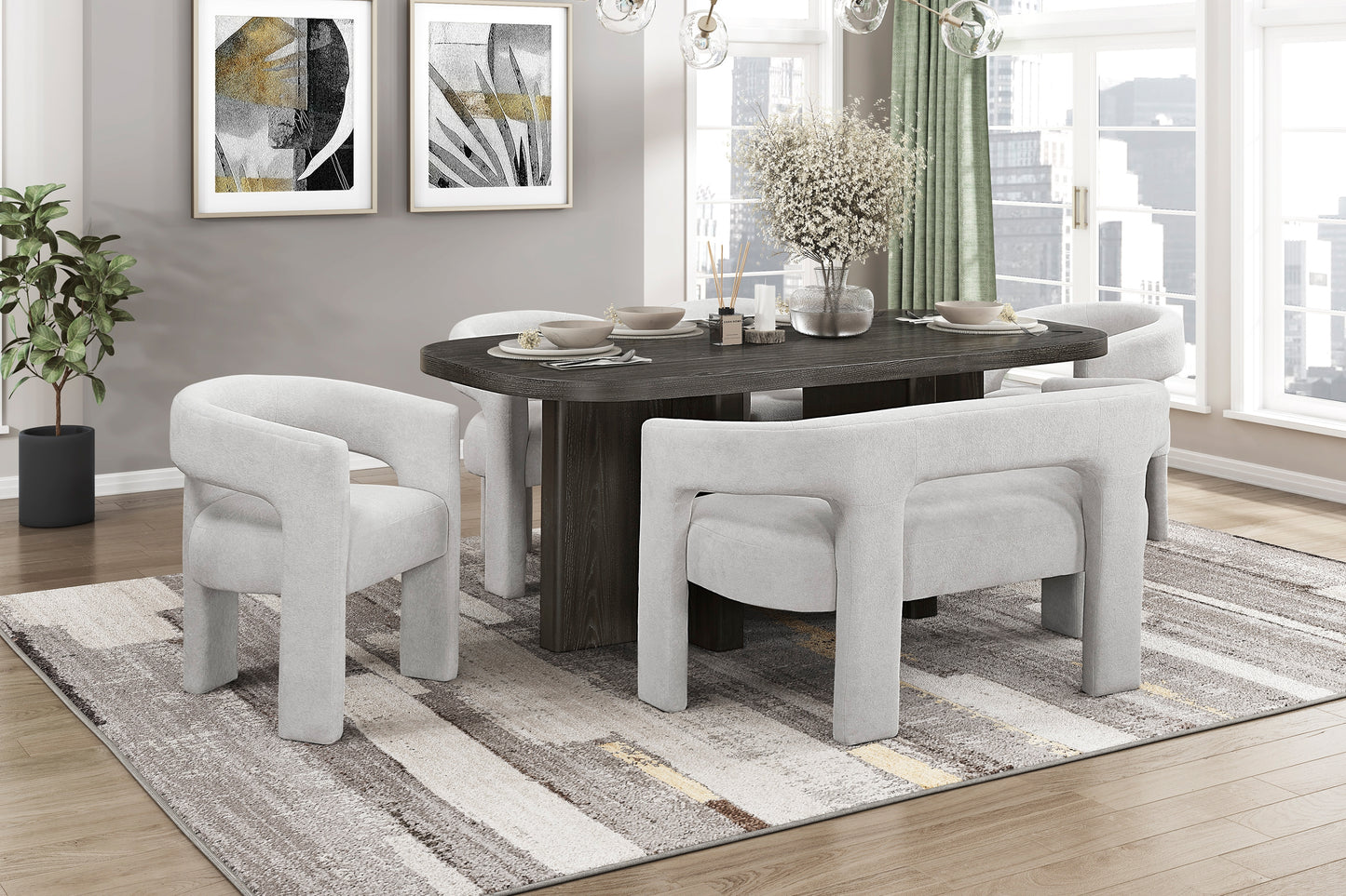 Dining room with a dark wooden table and white chairs on a striped rug.