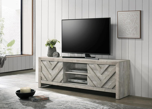 Valor TV Stand featuring a washed wood finish with geometric chevron-patterned cabinet doors, offering a blend of rustic charm and modern sophistication.

