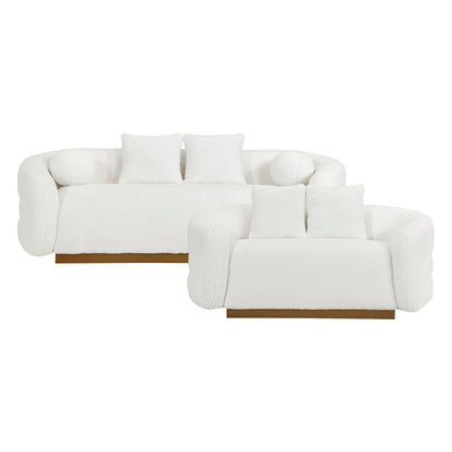 Detailed view of the Novella Collection sofa's attached cushions and matching pillows, showcasing the soft sherpa fabric – available at Paty Furniture in Tacoma, Kent, and Burien.