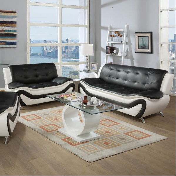 Modern living room with black and white furniture set, glass coffee table, and city view.