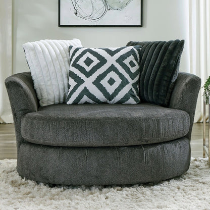 Loughlin Collection swivel chair with a spacious 58-inch width, ultra-soft back cushions, and 360-degree rotation in gun metal chenille – available at Paty Furniture in Tacoma, Kent, and Burien.

