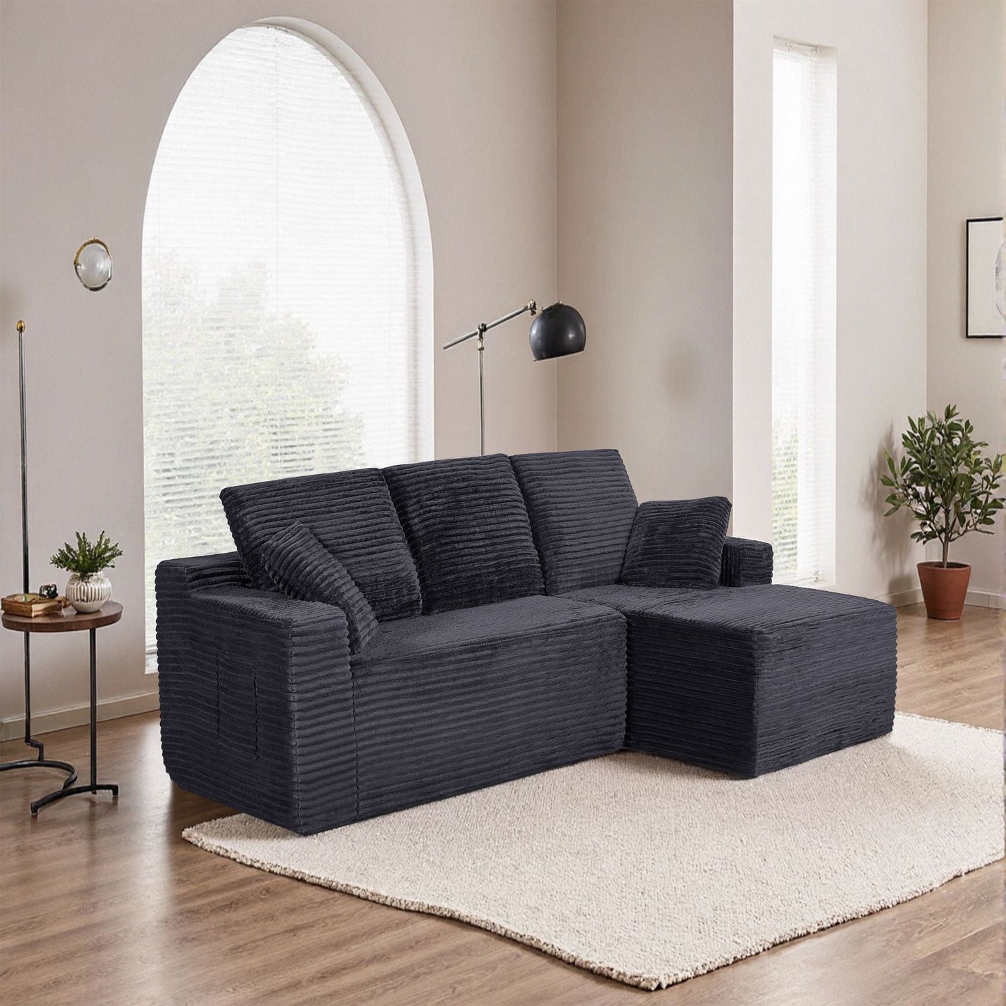 Black compressed cloud sectional sofa with deep low-profile seating