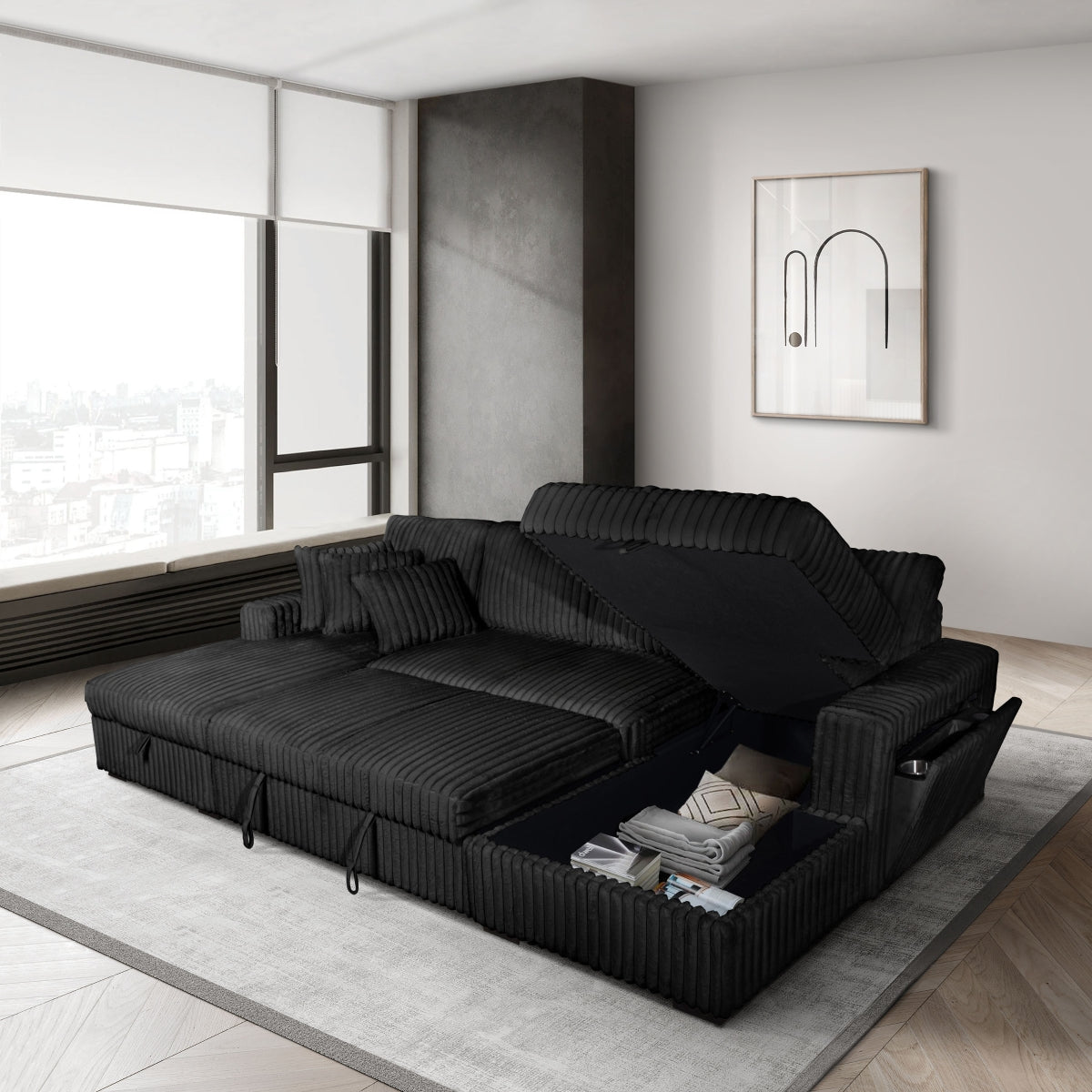 Black Riverton sectional with pop-up sleeper and storage chaises open