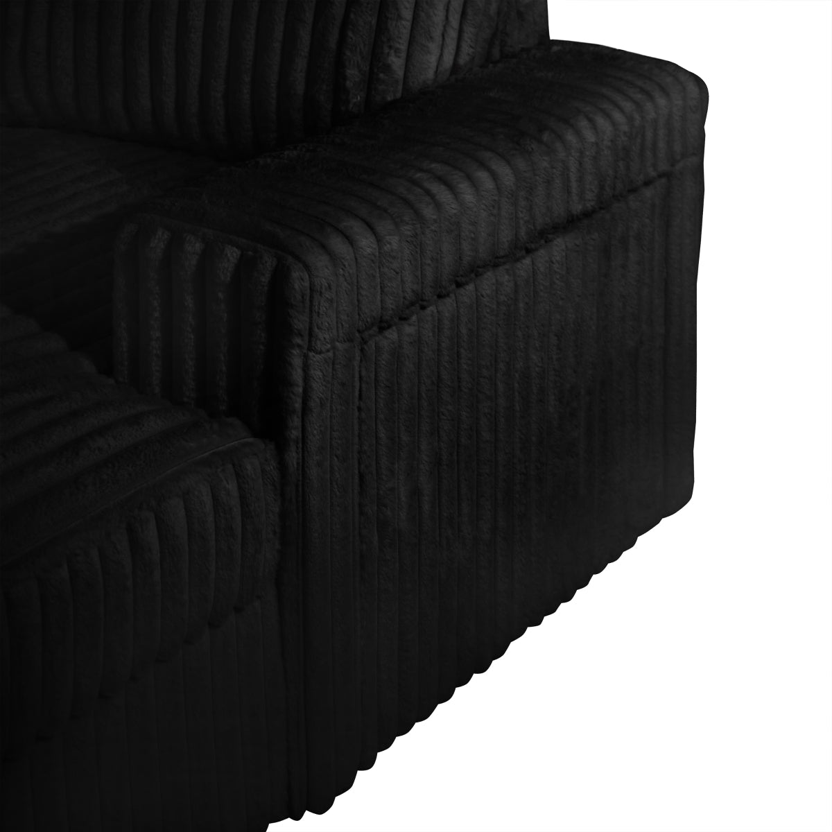 Black Riverton corduroy sectional upholstery and arm detail