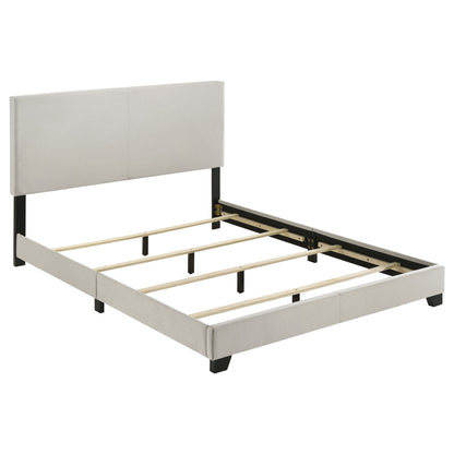 Dorian cream fabric upholstered queen panel bed, detail view