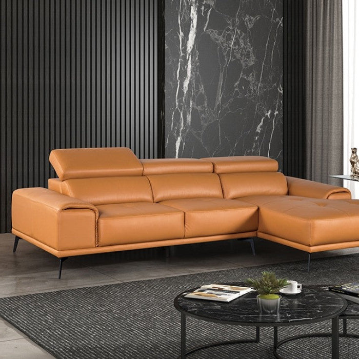 Brown leather sectional sofa in a modern living room with black marble wall and rug.