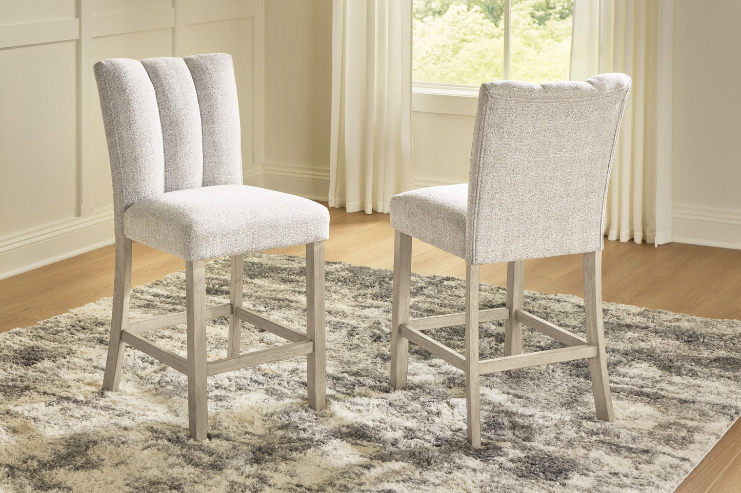 Larawyn soft gray upholstered counter-height barstool