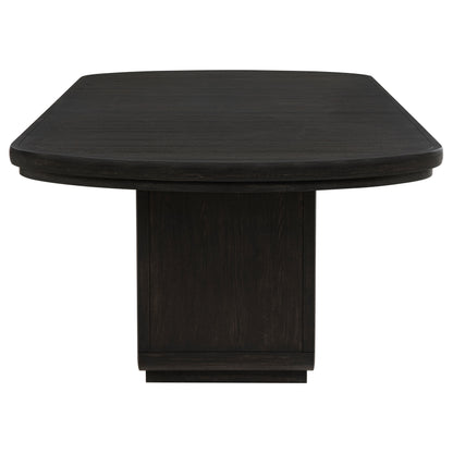 Leandro dining table and upholstered chairs detail view