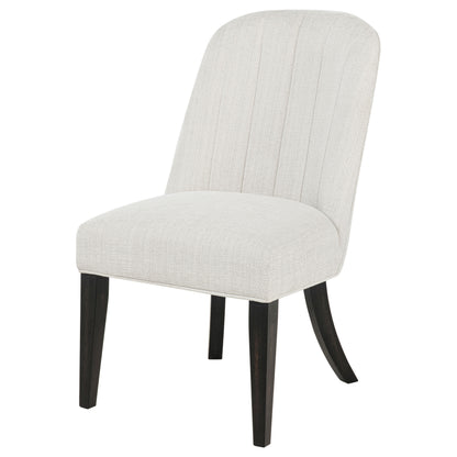 Leandro cream upholstered dining side chair with burnished black legs