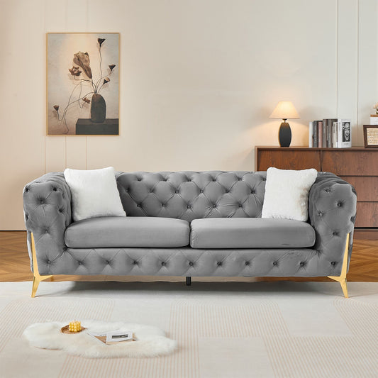 Sloane gray velvet Chesterfield sofa with button tufting and gold legs