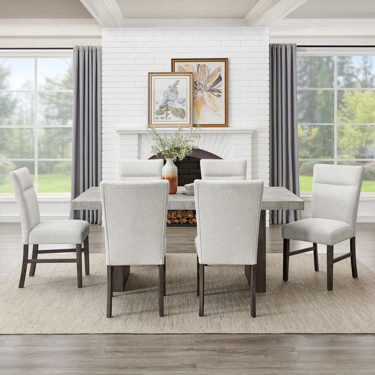Sorlen 7-piece dining set with faux concrete table and six light gray upholstered chairs